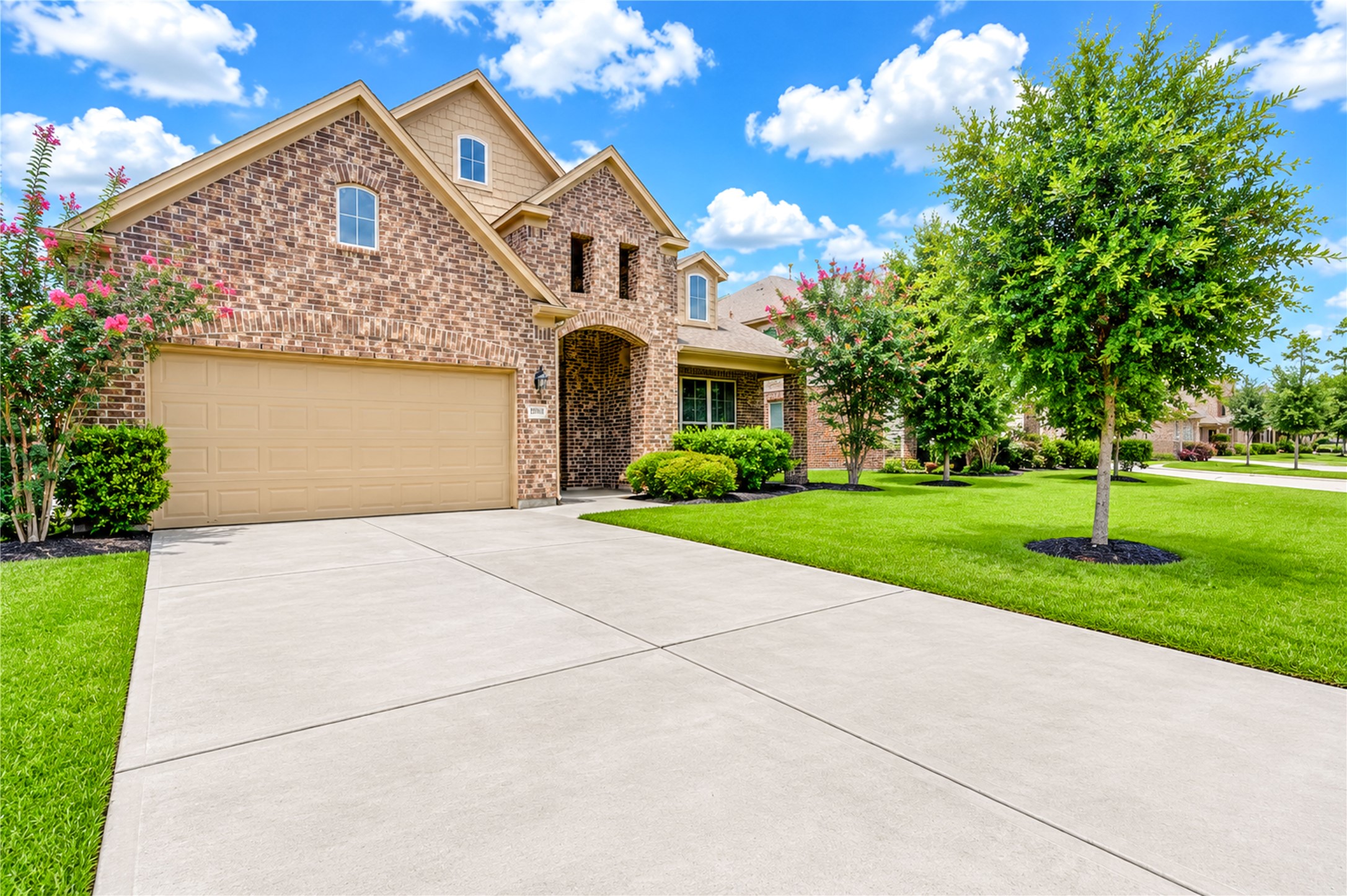 24511 Stratton Creek Drive Spring, TX 77373 - Photo 2 of 27 Enjoy a large front yard, charming covered porch, and attractive architectural details that welcome family and guests alike.
