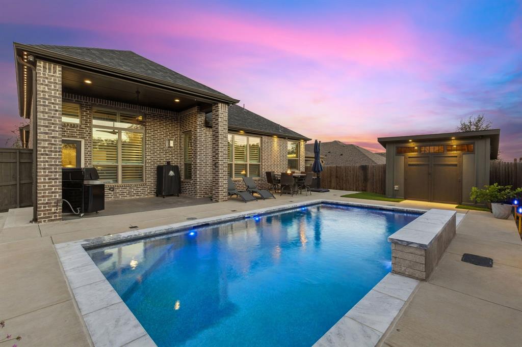 2925 Inn Kitchen Way McKinney, TX 75071 - Photo 2 of 40 a swimming pool with outdoor seating and yard