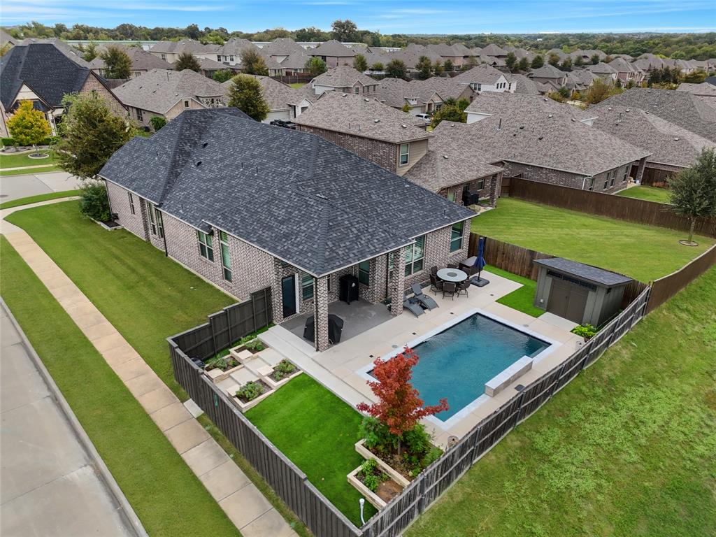 2925 Inn Kitchen Way McKinney, TX 75071 - Photo 33 of 40 an aerial view of a house with a garden