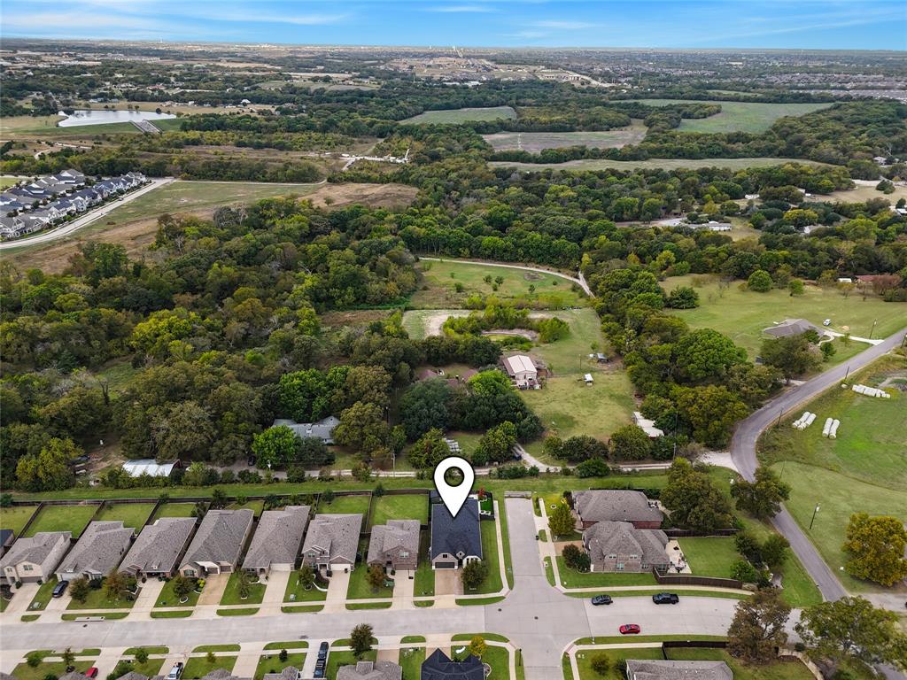 2925 Inn Kitchen Way McKinney, TX 75071 - Photo 36 of 40 an aerial view of residential houses with outdoor space and river