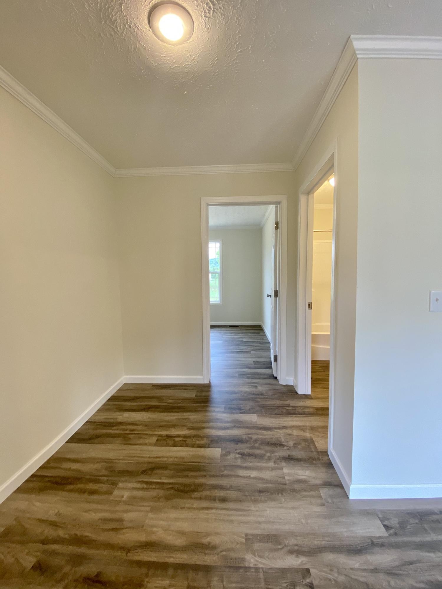 234 Walnut Grove Road Vonore, TN 37885 - Photo 15 of 26 a view of a livingroom with wooden floor