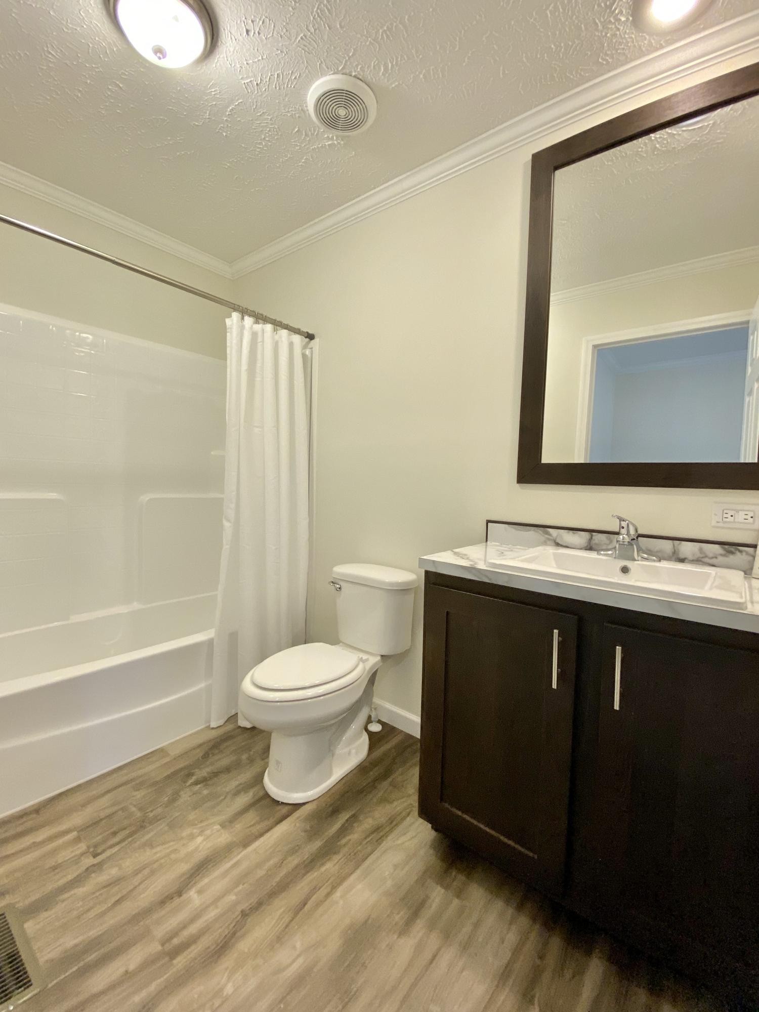 234 Walnut Grove Road Vonore, TN 37885 - Photo 19 of 26 a bathroom with a sink and a toilet