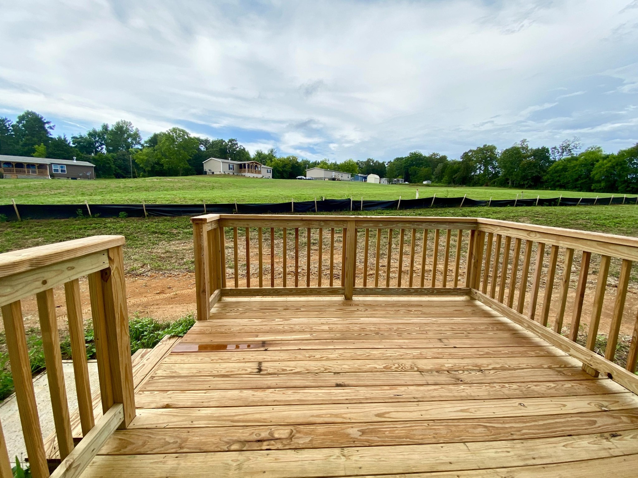 234 Walnut Grove Road Vonore, TN 37885 - Photo 20 of 26 a view of deck with swimming pool and green space