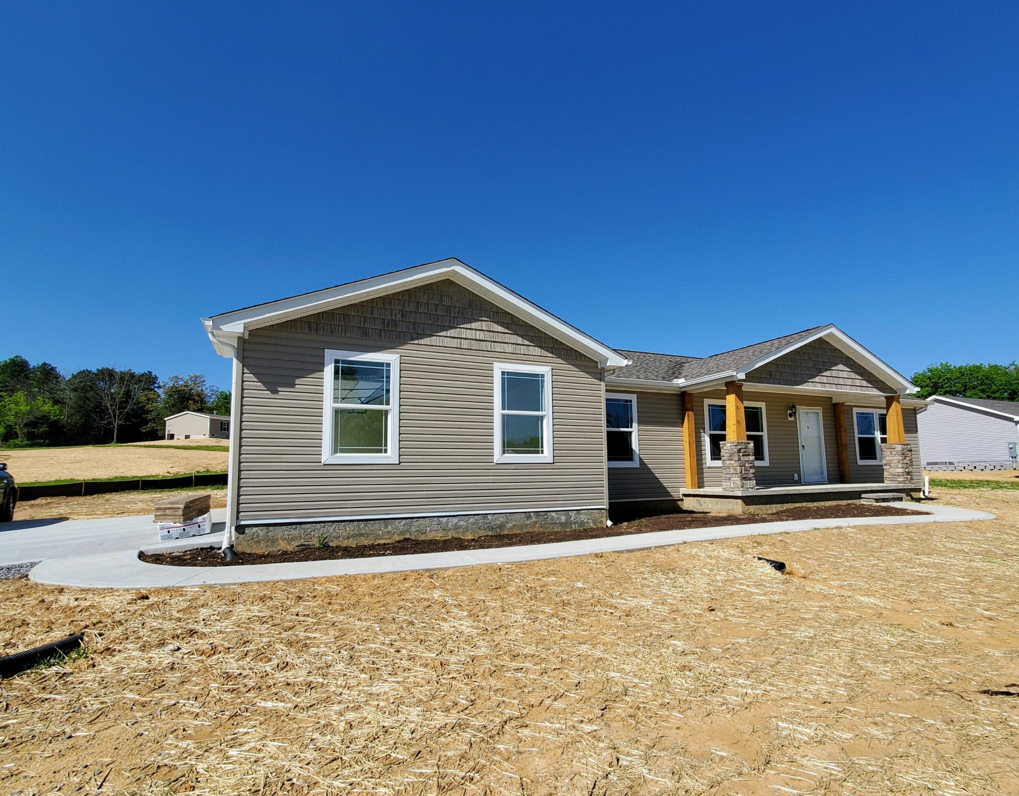 234 Walnut Grove Road Vonore, TN 37885 - Photo 2 of 26 a front view of a house with yard