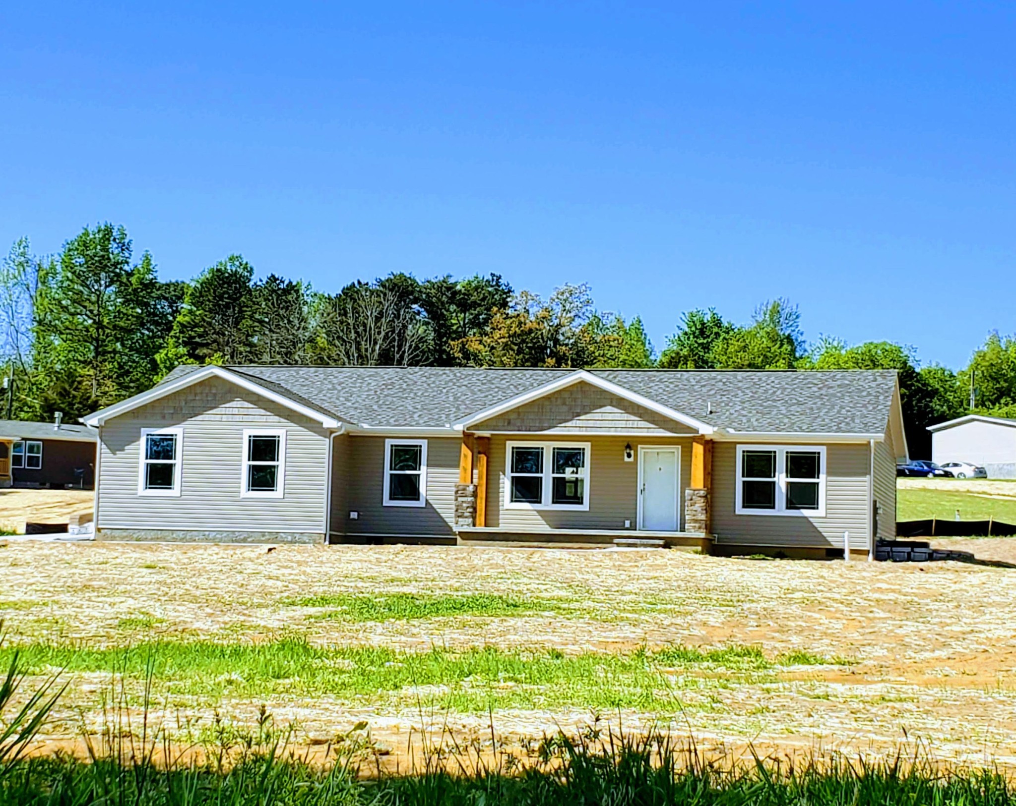 234 Walnut Grove Road Vonore, TN 37885 - Photo 26 of 26 a front view of a house with a garden