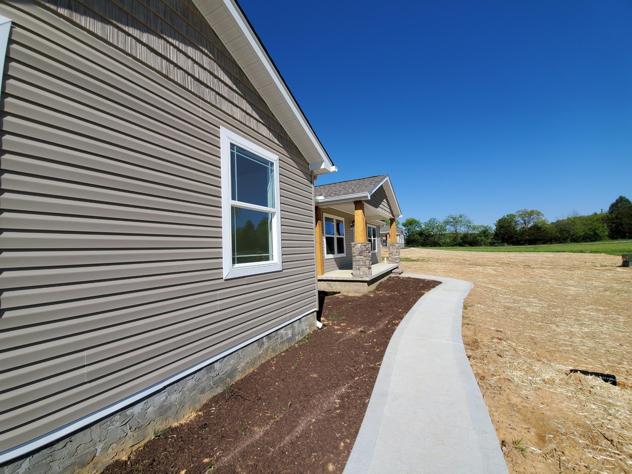 234 Walnut Grove Road Vonore, TN 37885 - Photo 3 of 26 a house with yard and outdoor space