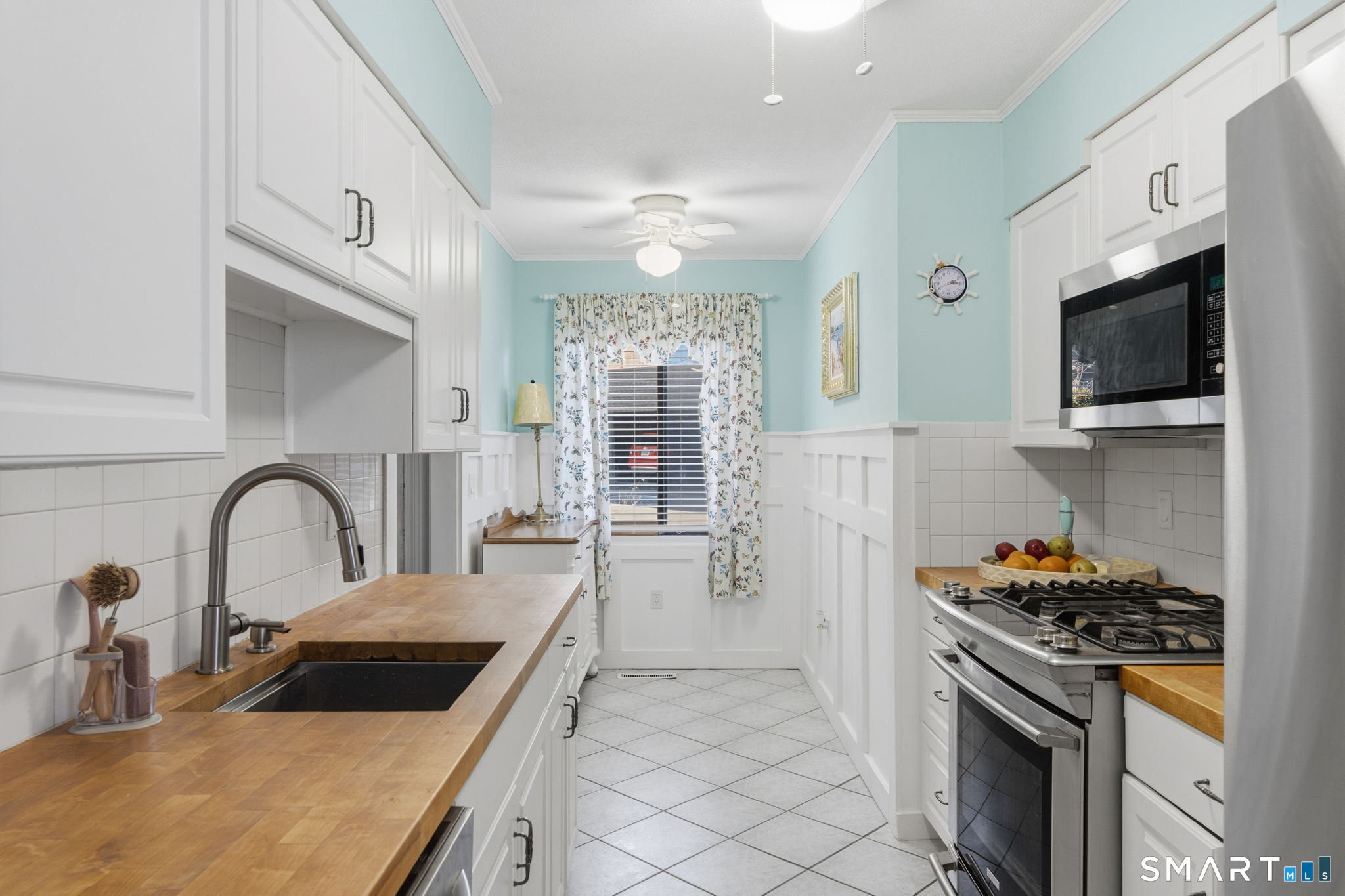 1 Coach Drive, Unit 1 Southington, CT 06489 - Photo 15 of 39 a kitchen with a sink a stove and cabinets