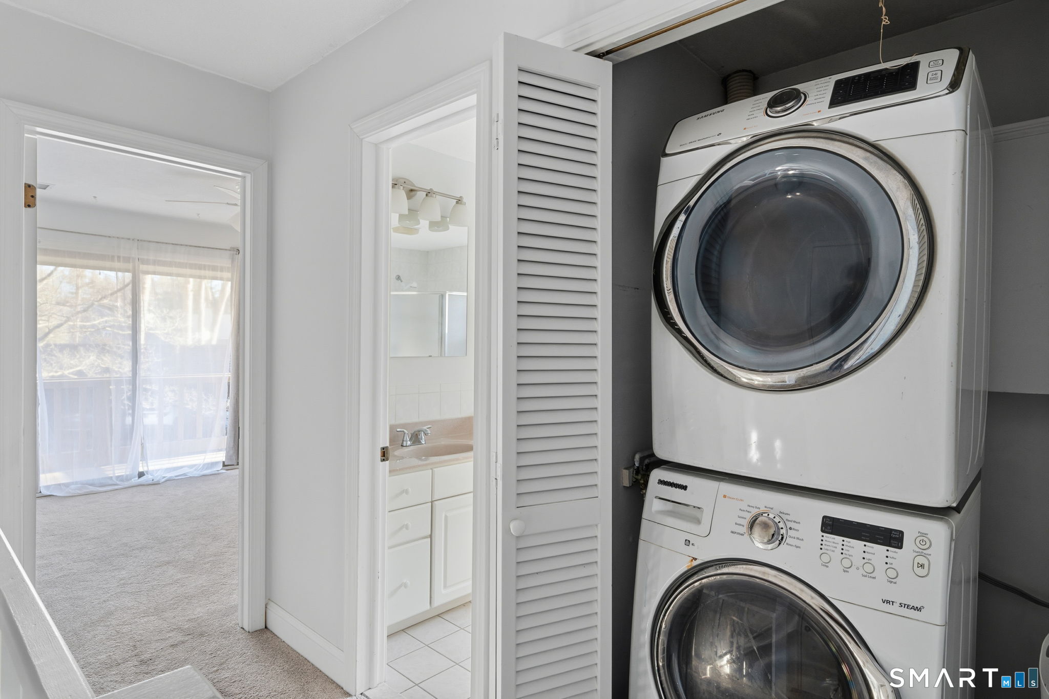 1 Coach Drive, Unit 1 Southington, CT 06489 - Photo 21 of 39 a utility room with dryer and washer