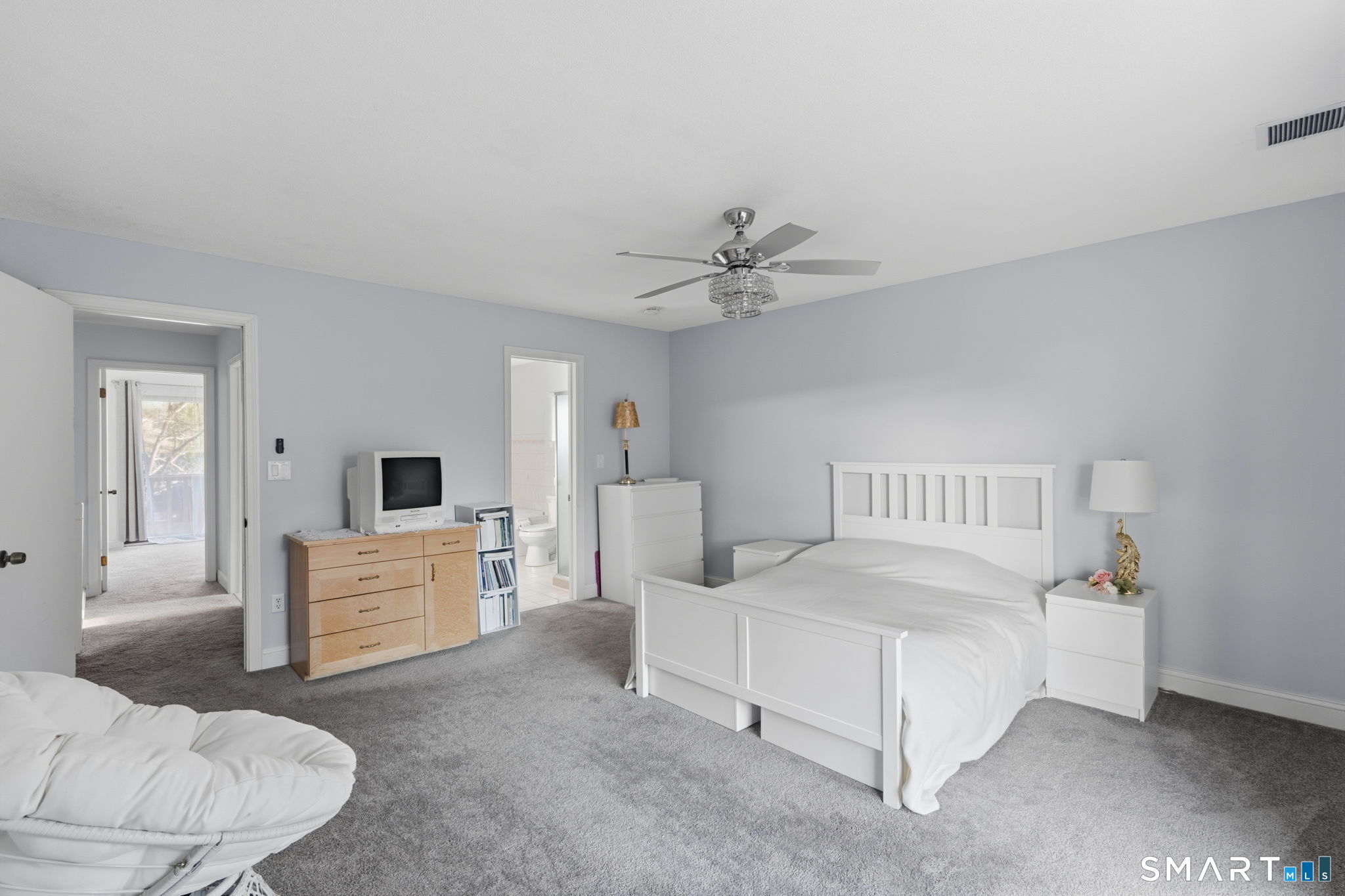 1 Coach Drive, Unit 1 Southington, CT 06489 - Photo 23 of 39 a bedroom with furniture and white walls