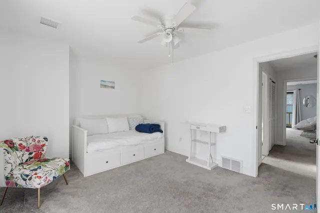 a view of balcony with a couple of trees