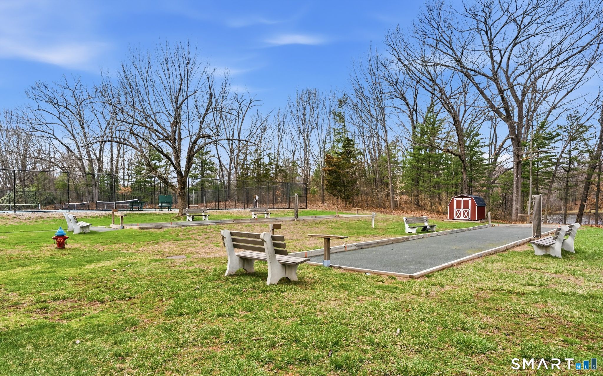 1 Coach Drive, Unit 1 Southington, CT 06489 - Photo 37 of 39 a view of a park with swings and slides