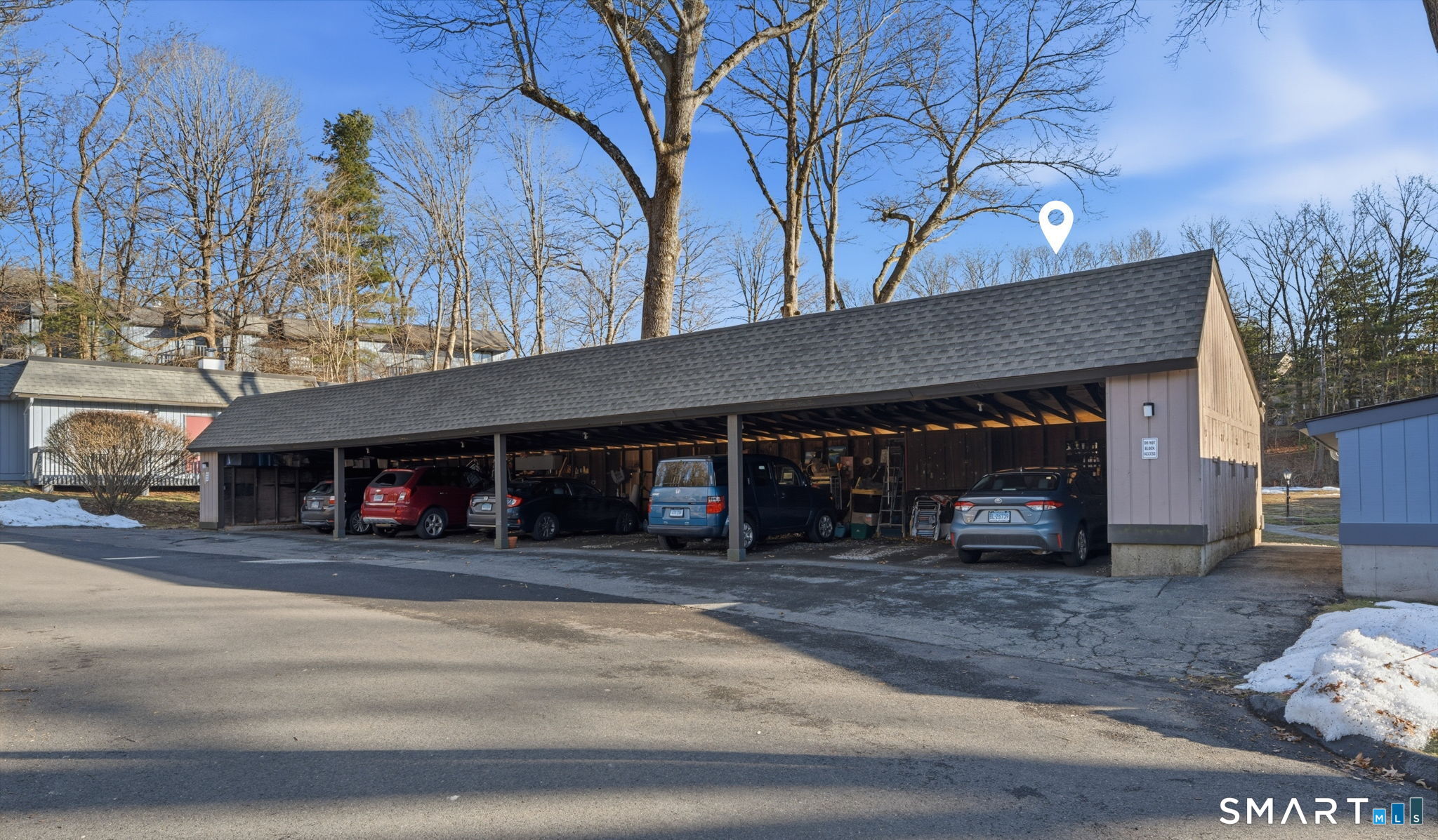 1 Coach Drive, Unit 1 Southington, CT 06489 - Photo 5 of 39 a view of a chairs and a garage