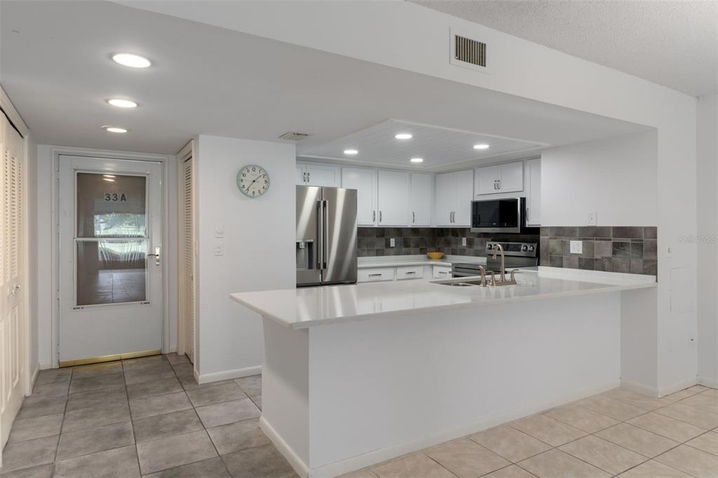 3 Cypress Run, Unit 33A Homosassa, FL 34446 - Photo 26 of 54 a view of kitchen with stainless steel appliances granite countertop a refrigerator and a sink