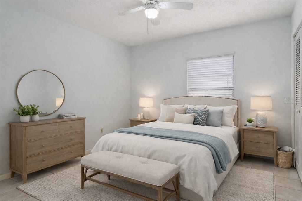 3 Cypress Run, Unit 33A Homosassa, FL 34446 - Photo 34 of 54 a bedroom with a bed and a dresser