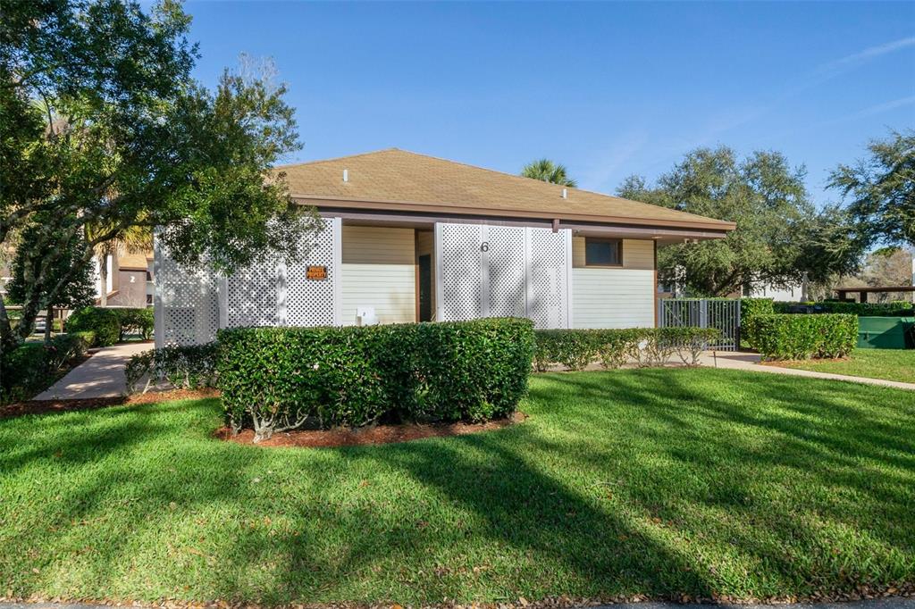 3 Cypress Run, Unit 33A Homosassa, FL 34446 - Photo 41 of 54 a front view of a house with a yard