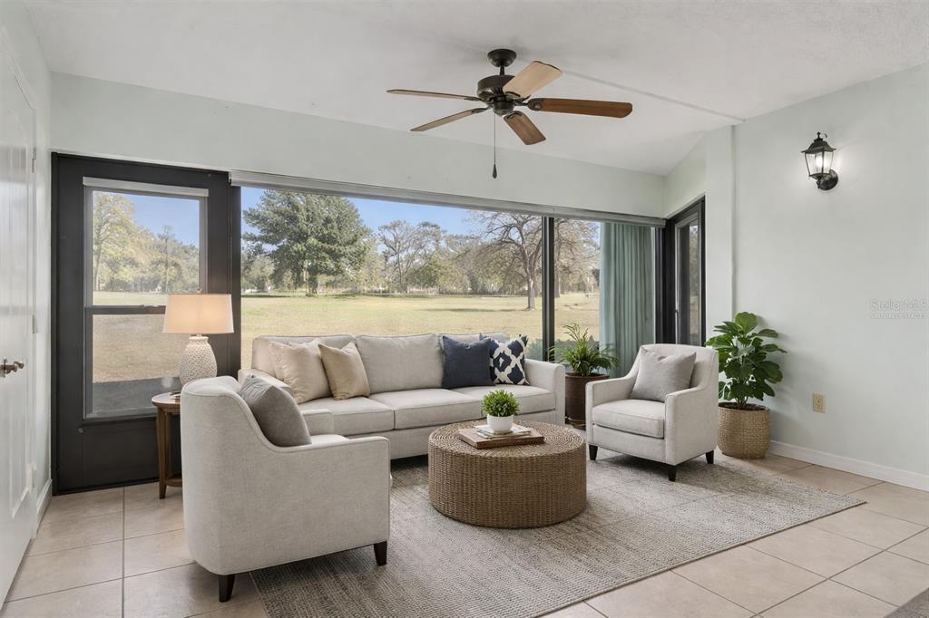 3 Cypress Run, Unit 33A Homosassa, FL 34446 - Photo 8 of 54 a living room with furniture and a large window