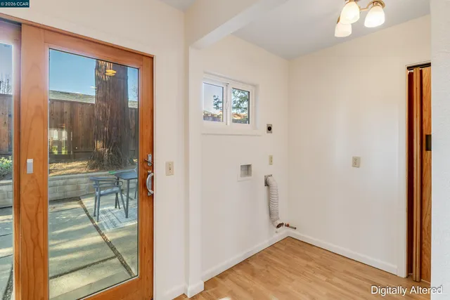 a kitchen with a refrigerator a sink and a stove