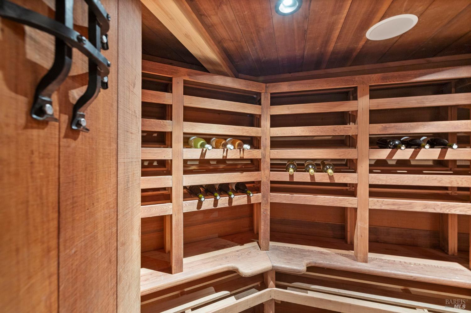 2563 Laguna Road Santa Rosa, CA 95401 - Photo 48 of 63 A wine cellar — climate-controlled, holding over a thousand bottles — for the collection that deserves one.