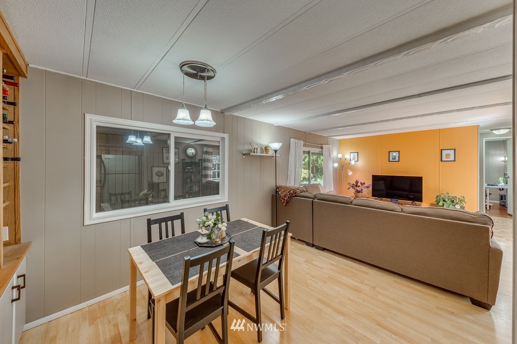 3318 206th Place Southeast Bothell, WA 98012 - Photo 18 of 35 a dining room with furniture and window