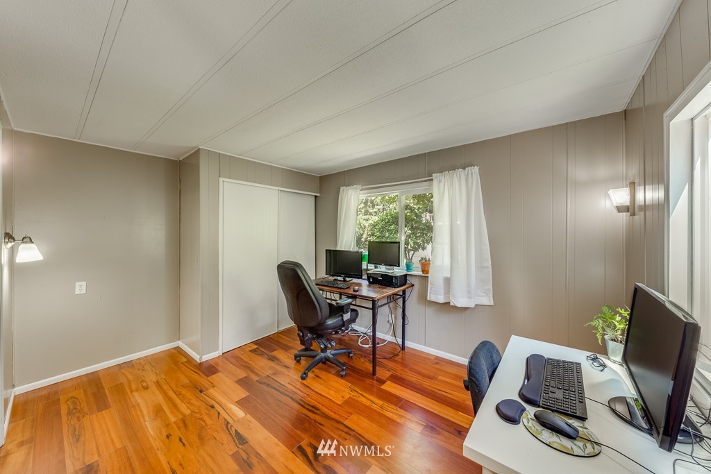 3318 206th Place Southeast Bothell, WA 98012 - Photo 24 of 35 a workspace with furniture and a window