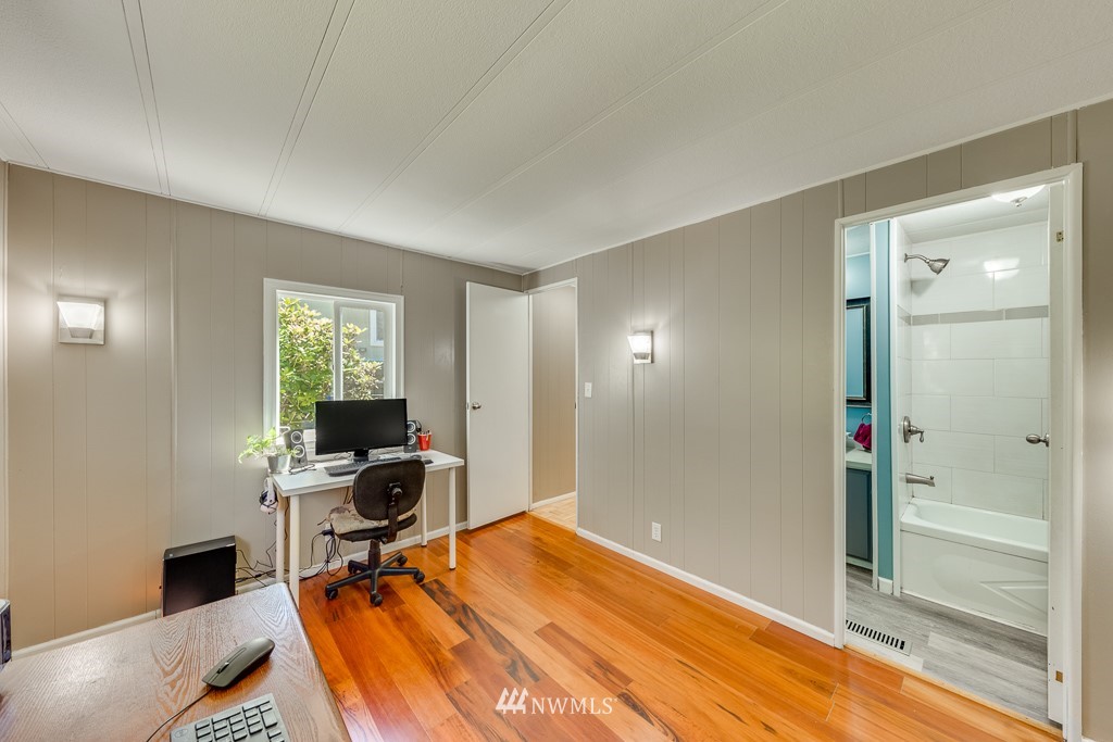 3318 206th Place Southeast Bothell, WA 98012 - Photo 25 of 35 a workspace with furniture and a window