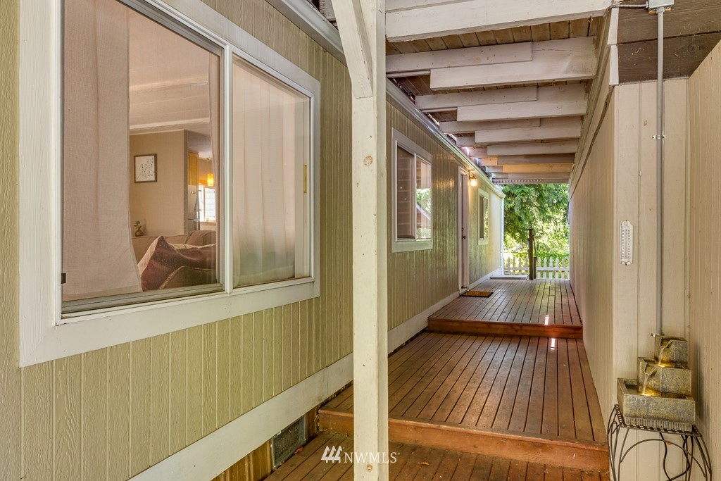 3318 206th Place Southeast Bothell, WA 98012 - Photo 8 of 35 a view of a balcony with wooden floor