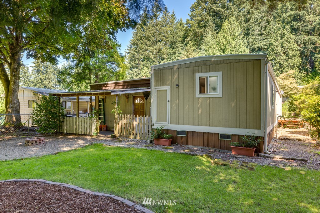 3318 206th Place Southeast Bothell, WA 98012 - Photo 10 of 35 a view of a backyard with a sitting area
