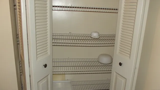 an empty room with a wooden door