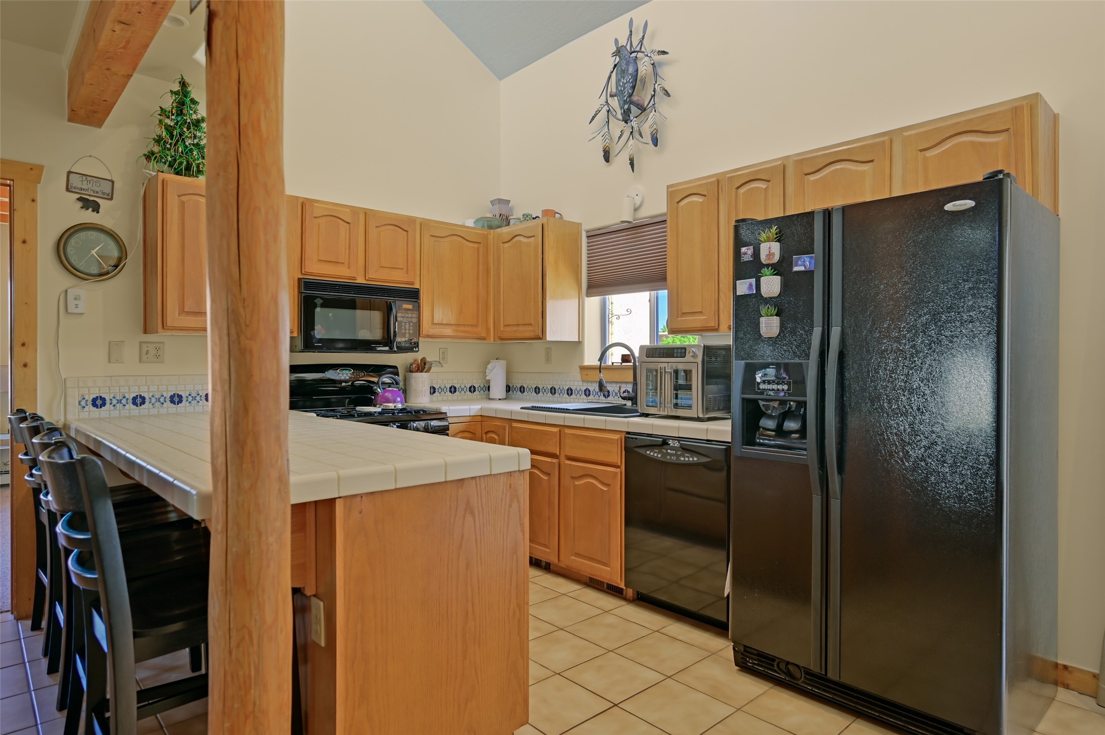 7516 Sagebrush Road Santa Fe, NM 87507 - Photo 6 of 27 Kitchen with peninsula / breakfast bar