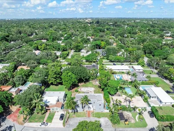 an aerial view of residential house with outdoor space and street view