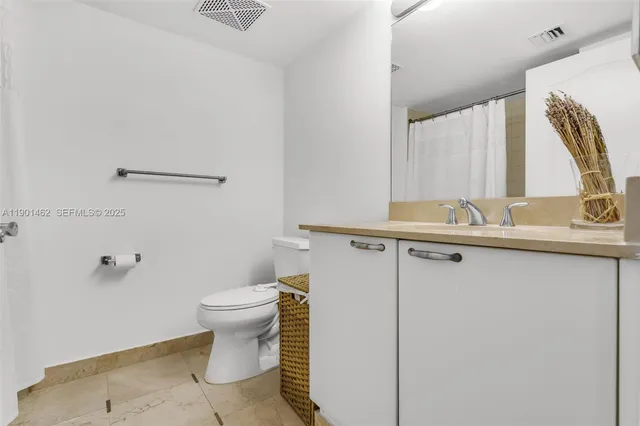 a bathroom with a sink and a toilet