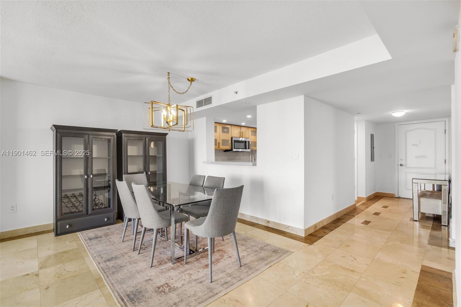 2101 Brickell Avenue, Unit 306 Miami, FL 33129 - Photo 23 of 49 a view of a dining room with furniture