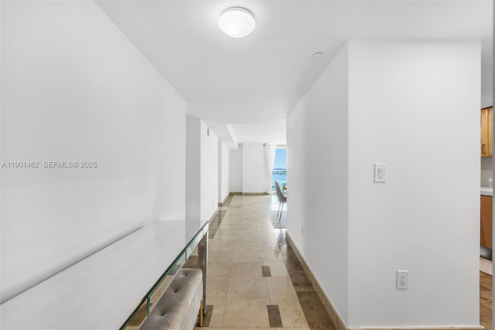 2101 Brickell Avenue, Unit 306 Miami, FL 33129 - Photo 32 of 49 a view of a hallway with wooden floor