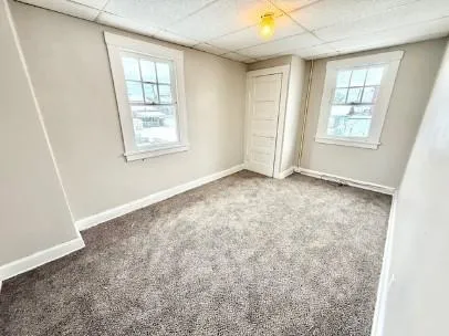 an empty room with windows