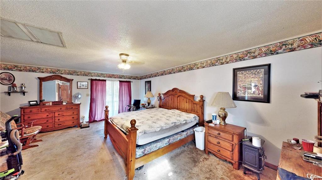 3834 Flynt Road Liberty, NC 27298 - Photo 22 of 40 Master bedroom, second level.
