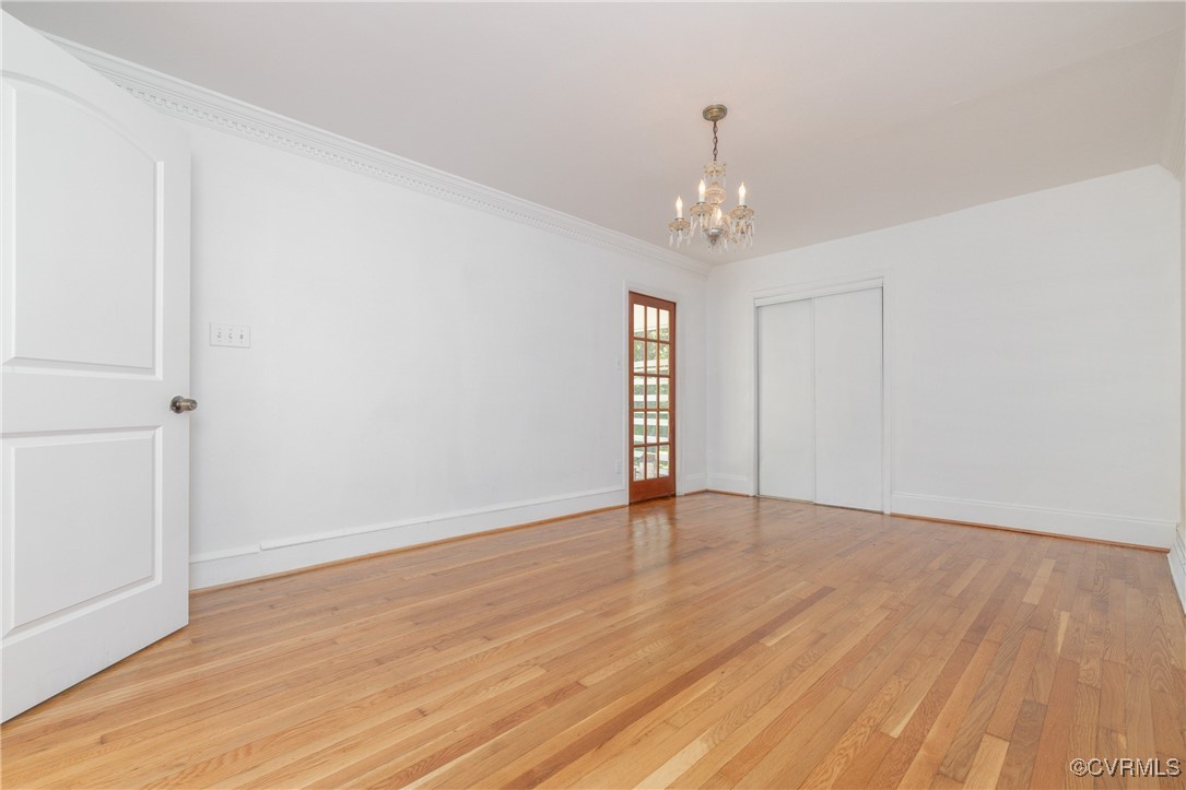 811 Forestview Drive Colonial Heights, VA 23834 - Photo 14 of 45 a view of an empty room with wooden floor and a window
