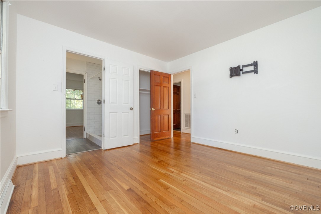 811 Forestview Drive Colonial Heights, VA 23834 - Photo 16 of 45 a view of an empty room with wooden floor