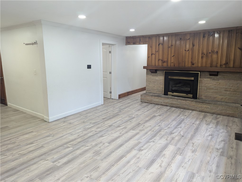811 Forestview Drive Colonial Heights, VA 23834 - Photo 39 of 45 an empty room with wooden floor fireplace and windows