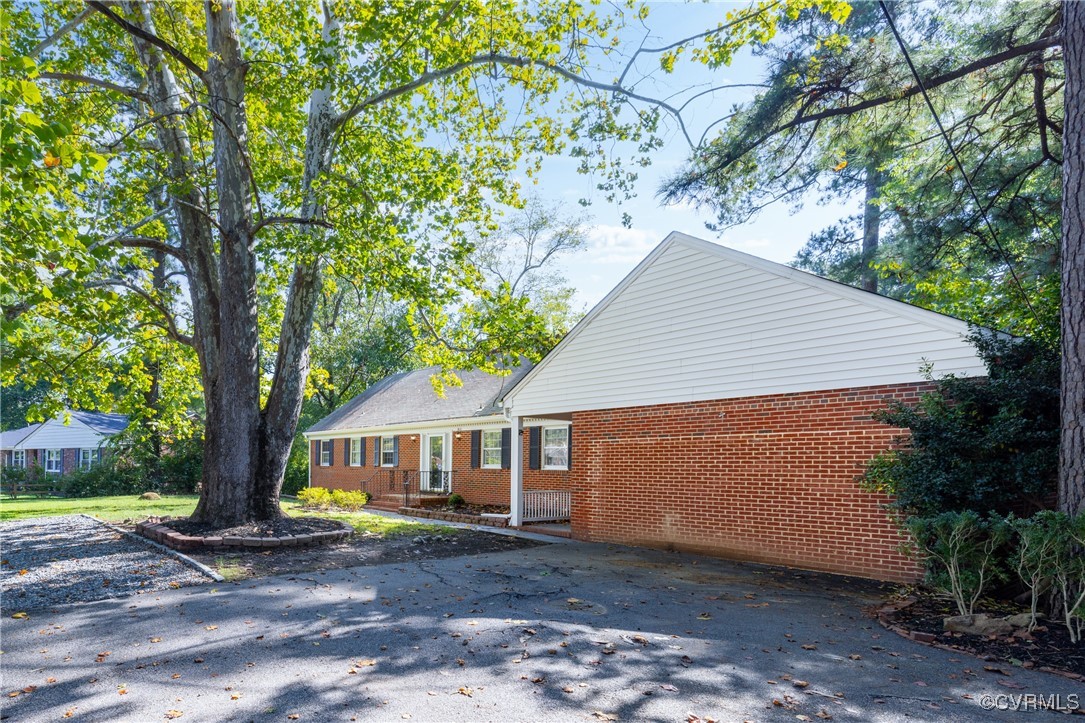 811 Forestview Drive Colonial Heights, VA 23834 - Photo 4 of 45 a view of a house with backyard and wooden fence