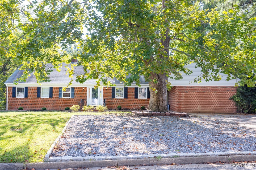 811 Forestview Drive Colonial Heights, VA 23834 - Photo 5 of 45 a front view of house with yard and trees in the background