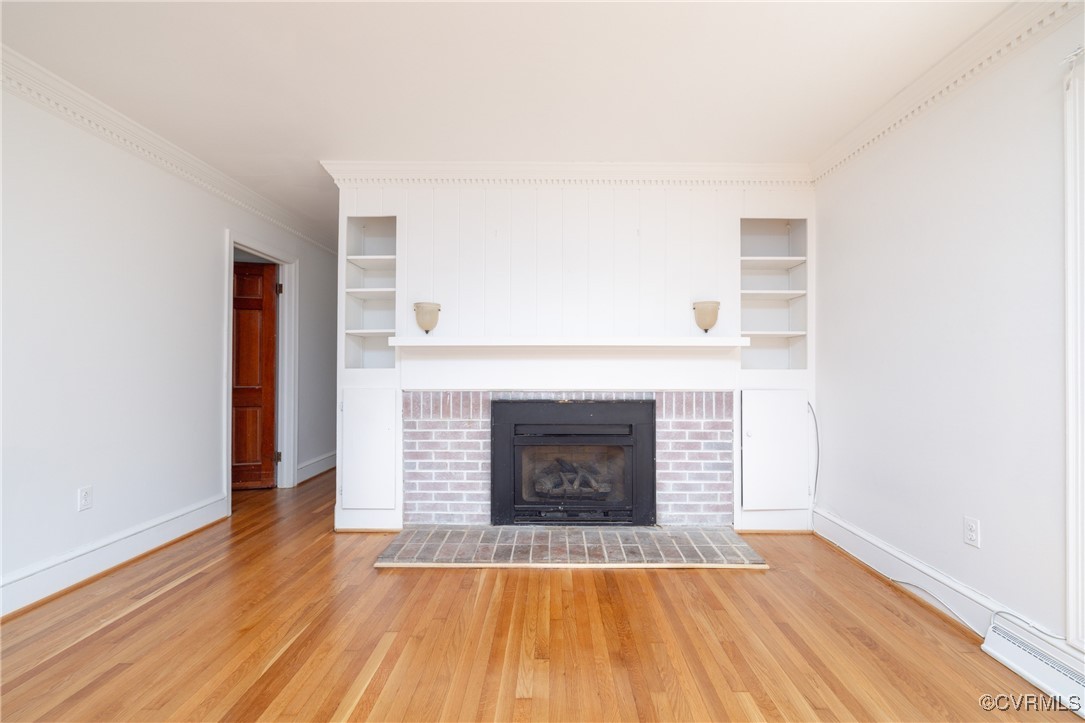 811 Forestview Drive Colonial Heights, VA 23834 - Photo 10 of 45 a view of empty room with wooden floor and fireplace