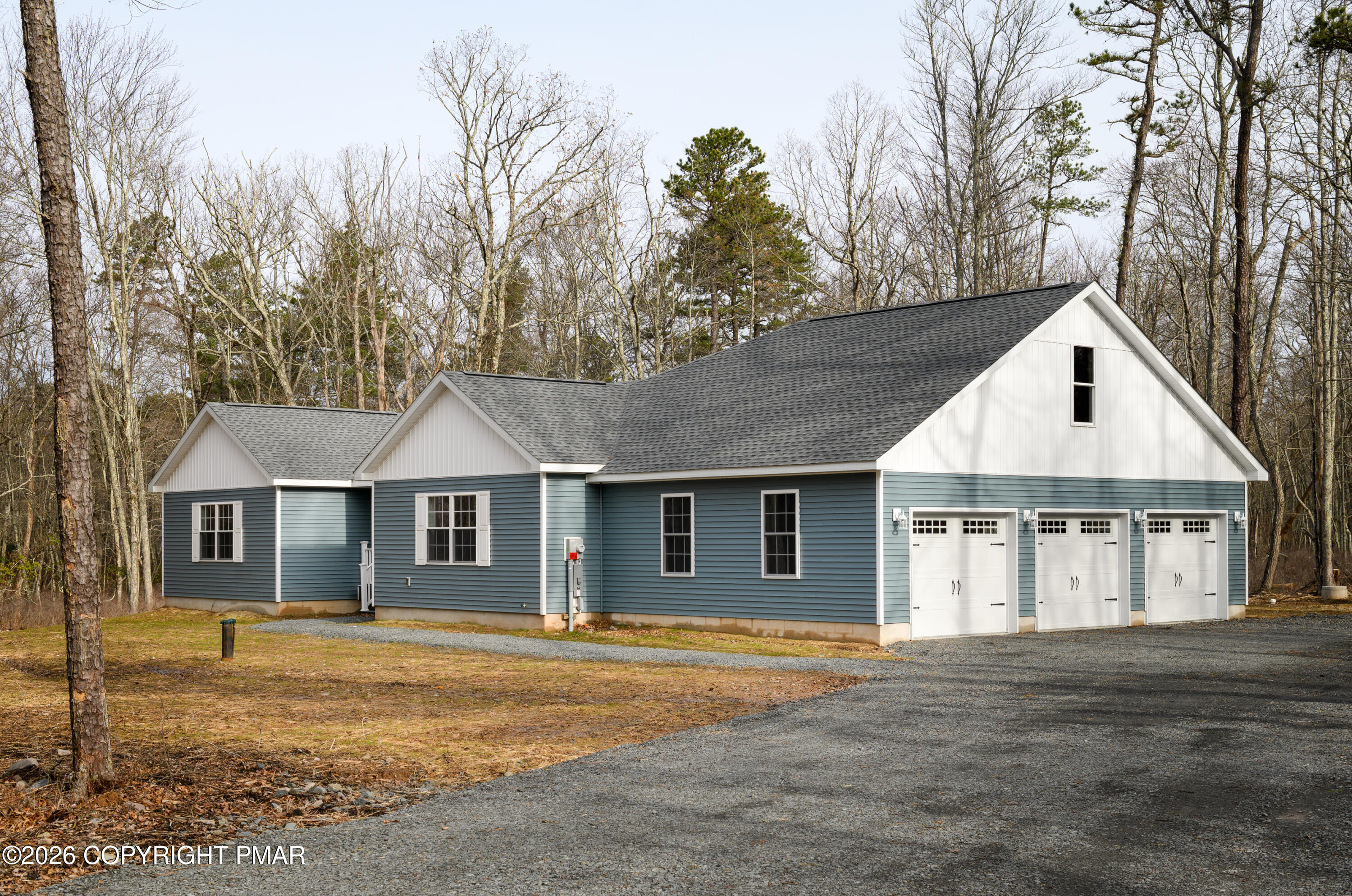 456 Big Oak Road Canadensis, PA 18325 - Photo 7 of 20 a view of a yard in front of a house with large trees