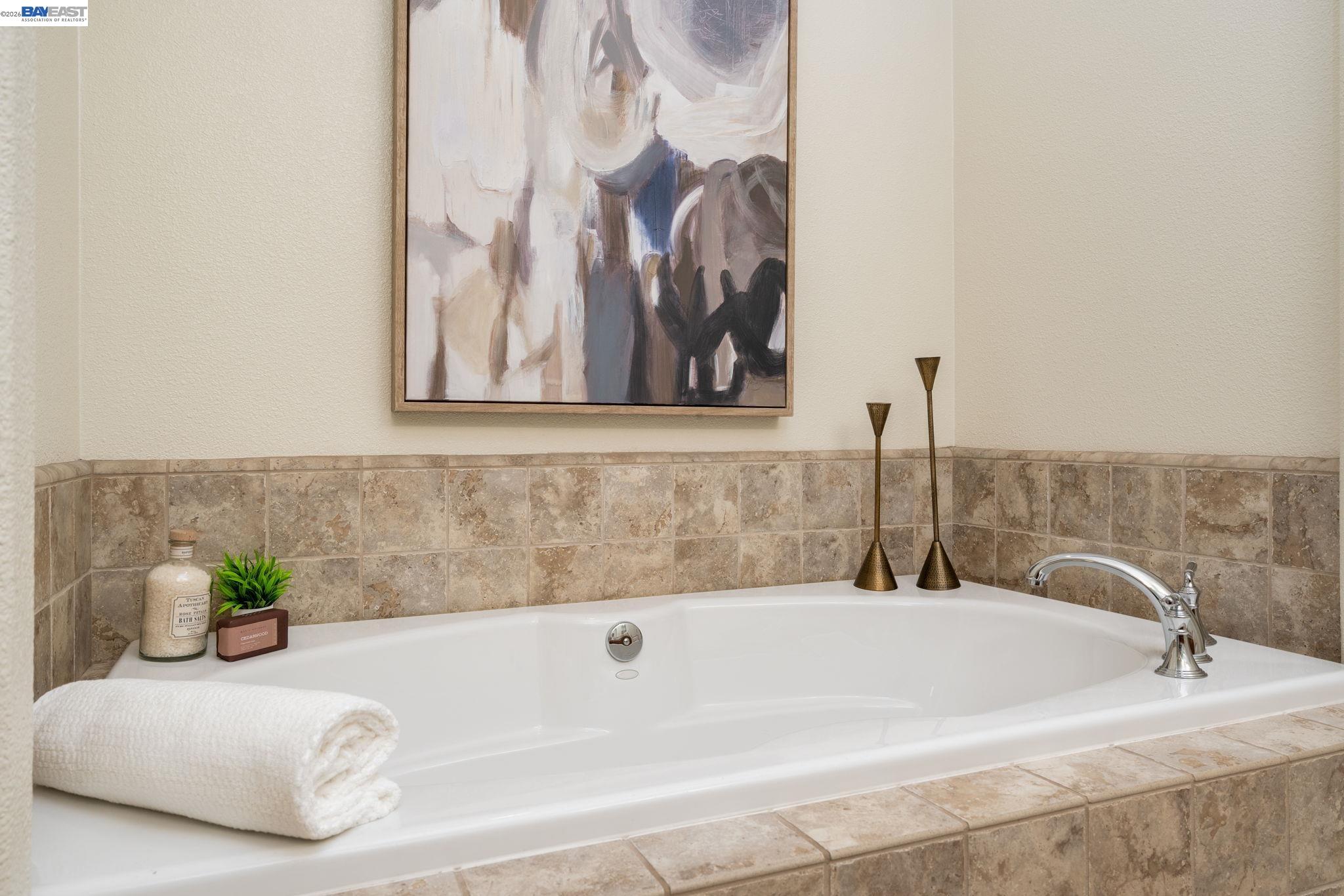 4653 Rimini Court Dublin, CA 94568 - Photo 32 of 44 a bathroom with a bathtub