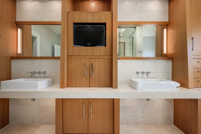 a kitchen with a sink and cabinets