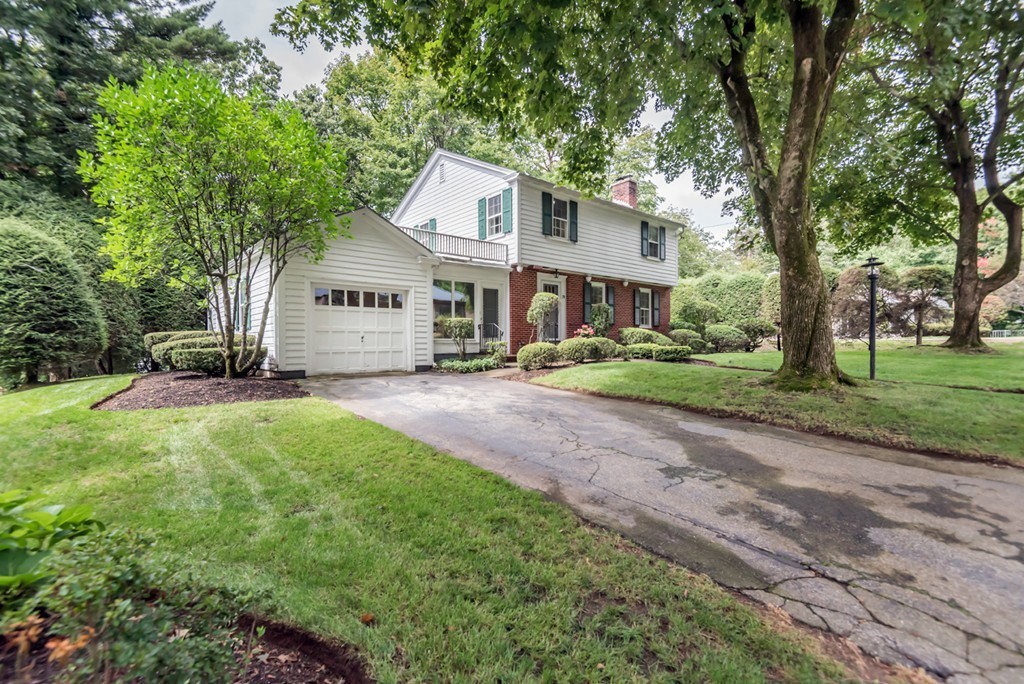 79 Cheever Circle Andover, MA 01810 - Photo 30 of 30 a front view of a house with a yard and trees