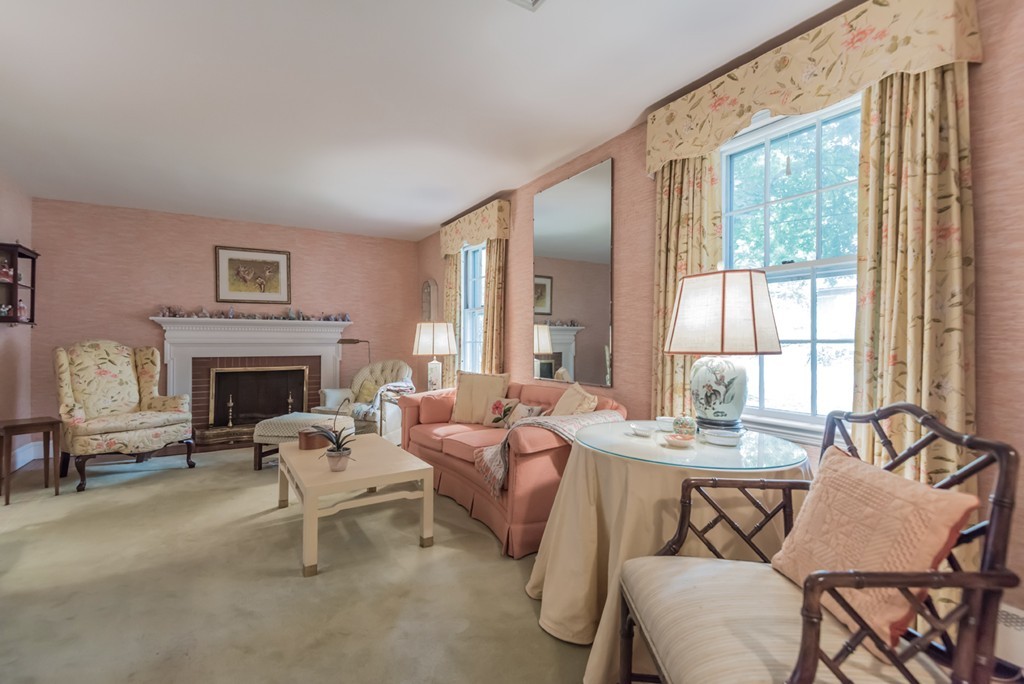 79 Cheever Circle Andover, MA 01810 - Photo 5 of 30 a living room with furniture and a fireplace
