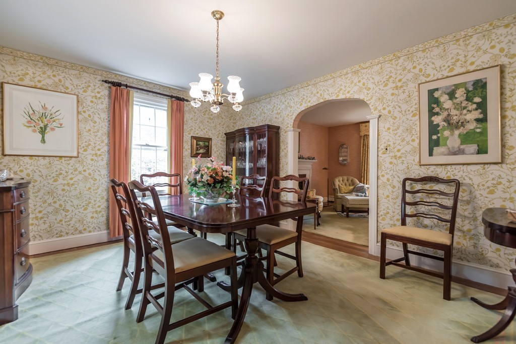 79 Cheever Circle Andover, MA 01810 - Photo 8 of 30 a view of a dining room with furniture window and wooden floor