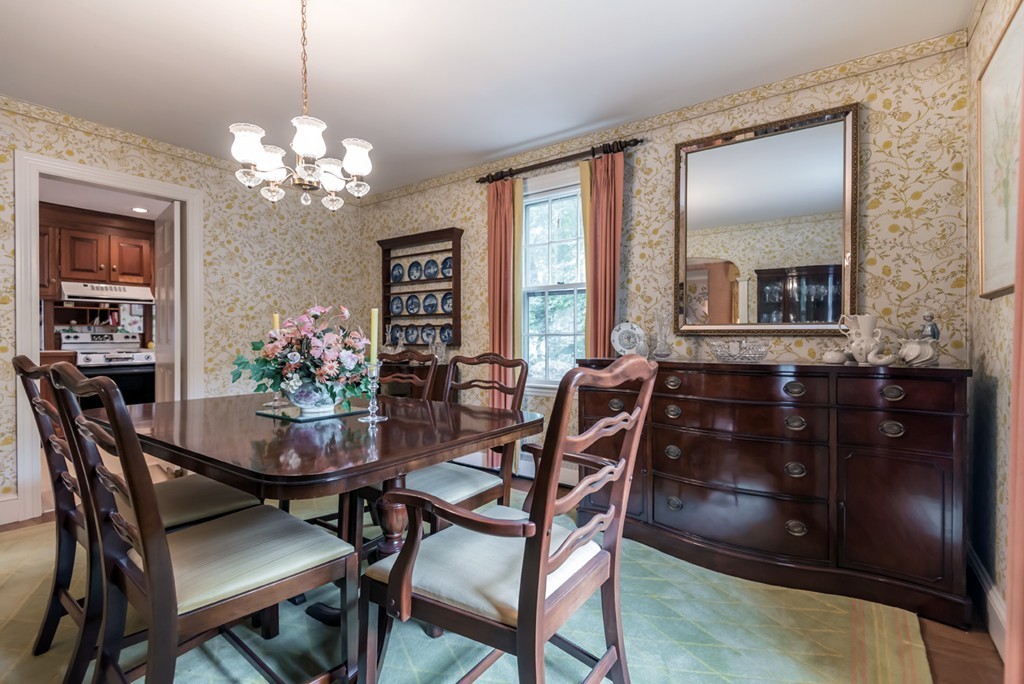 79 Cheever Circle Andover, MA 01810 - Photo 9 of 30 a view of a dining room with furniture and chandelier