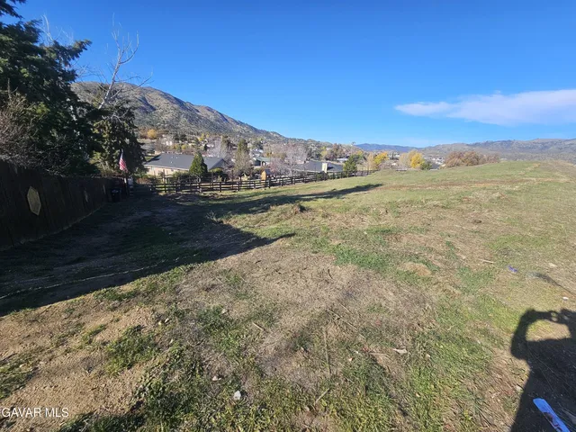 a view of lake with mountain
