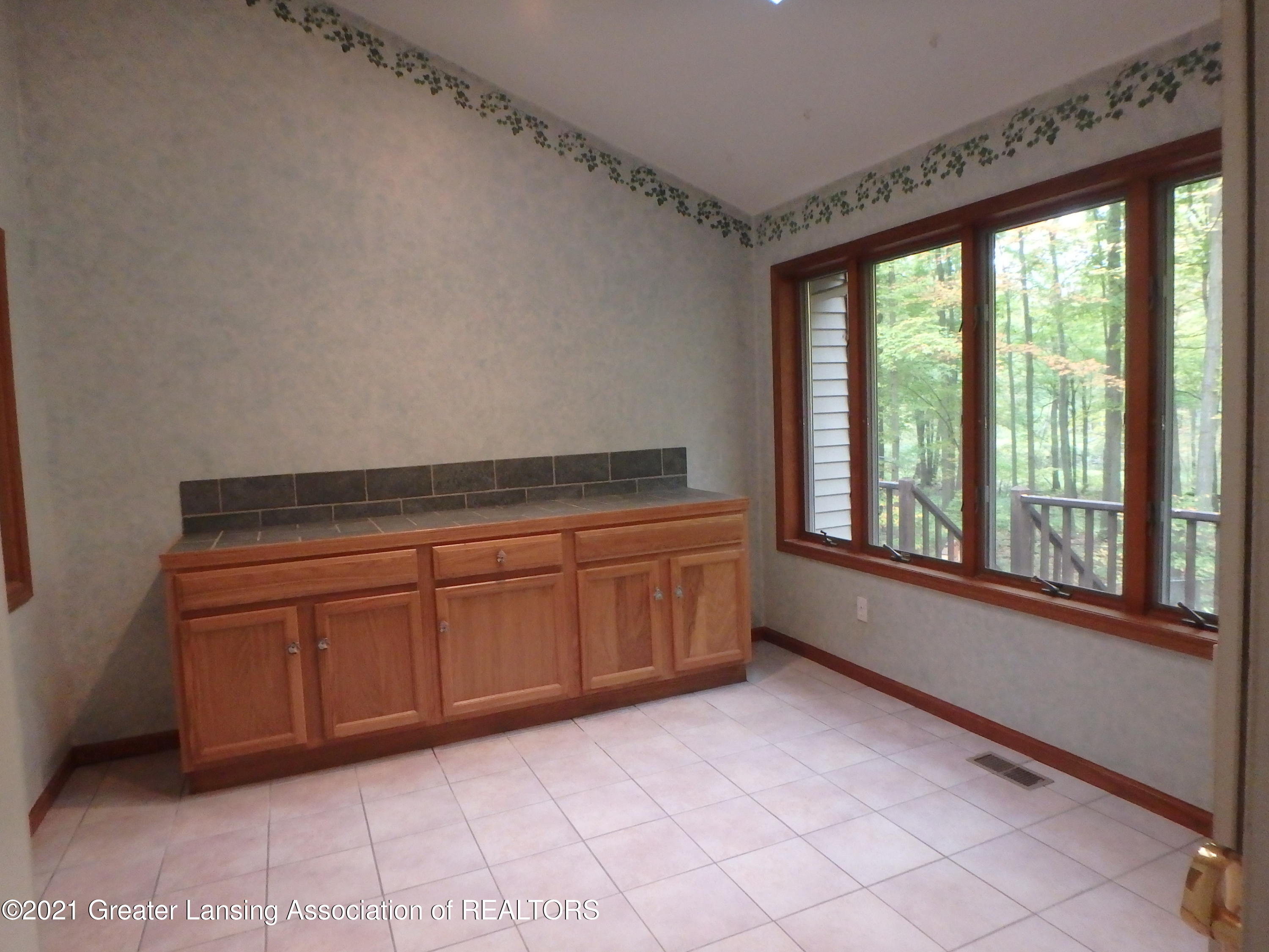 2565 Narrow Lake Road Charlotte, MI 48813 - Photo 14 of 63 sun room